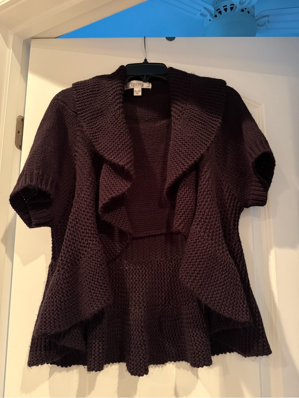 Decree Short-Sleeve Open-Front Knit Cardigan in Black.